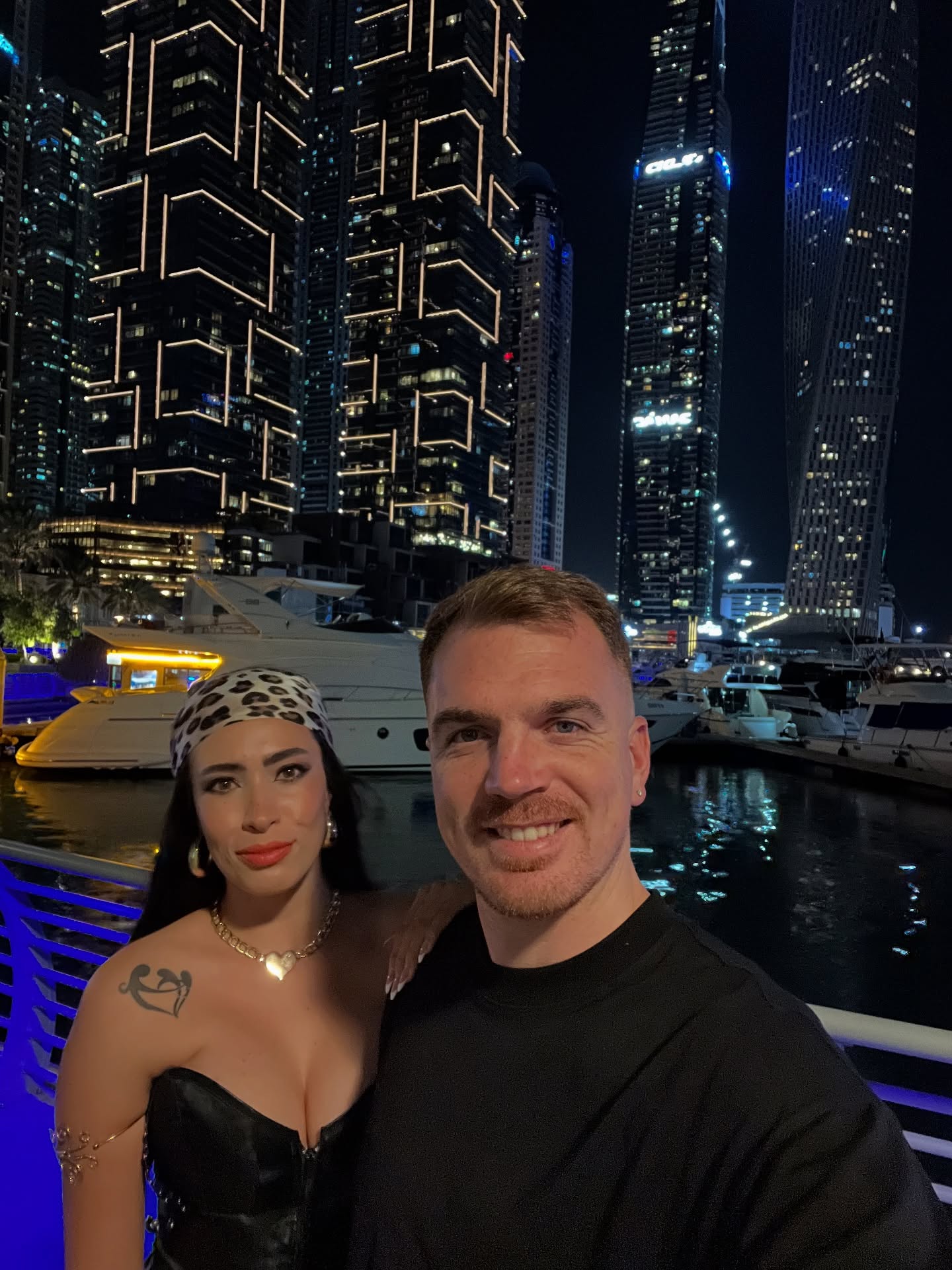 Alessandro Picchianti and his wife at Dubai Marina at night during their first visit, 2022