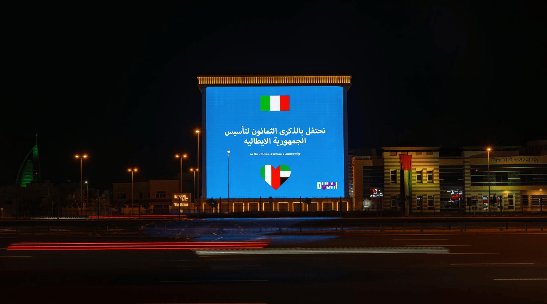 Giant screen on Sheikh Zayed Road in Dubai celebrating the Italian Republic and the Italian-Emirati community