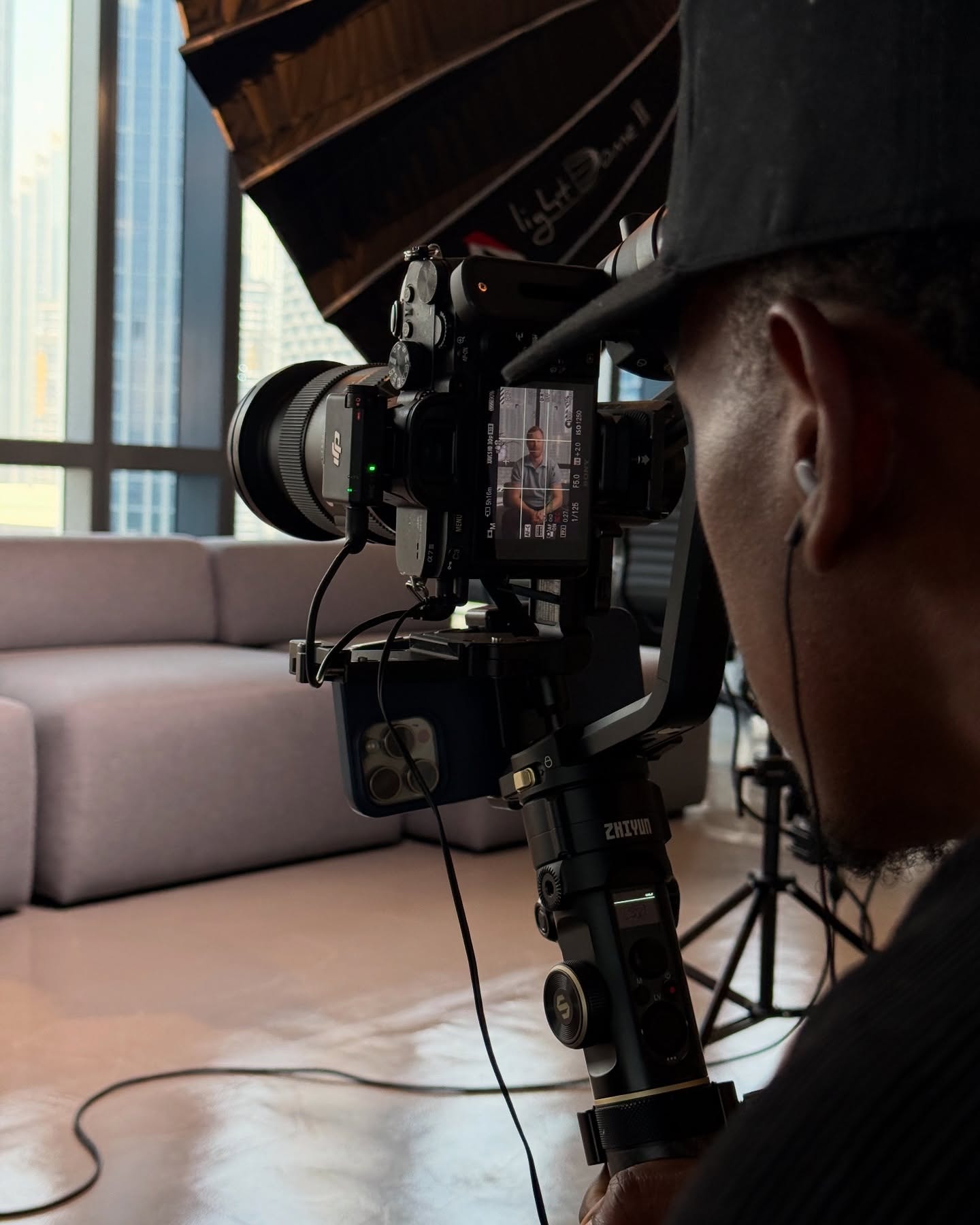 Camera operator filming a brand content shoot