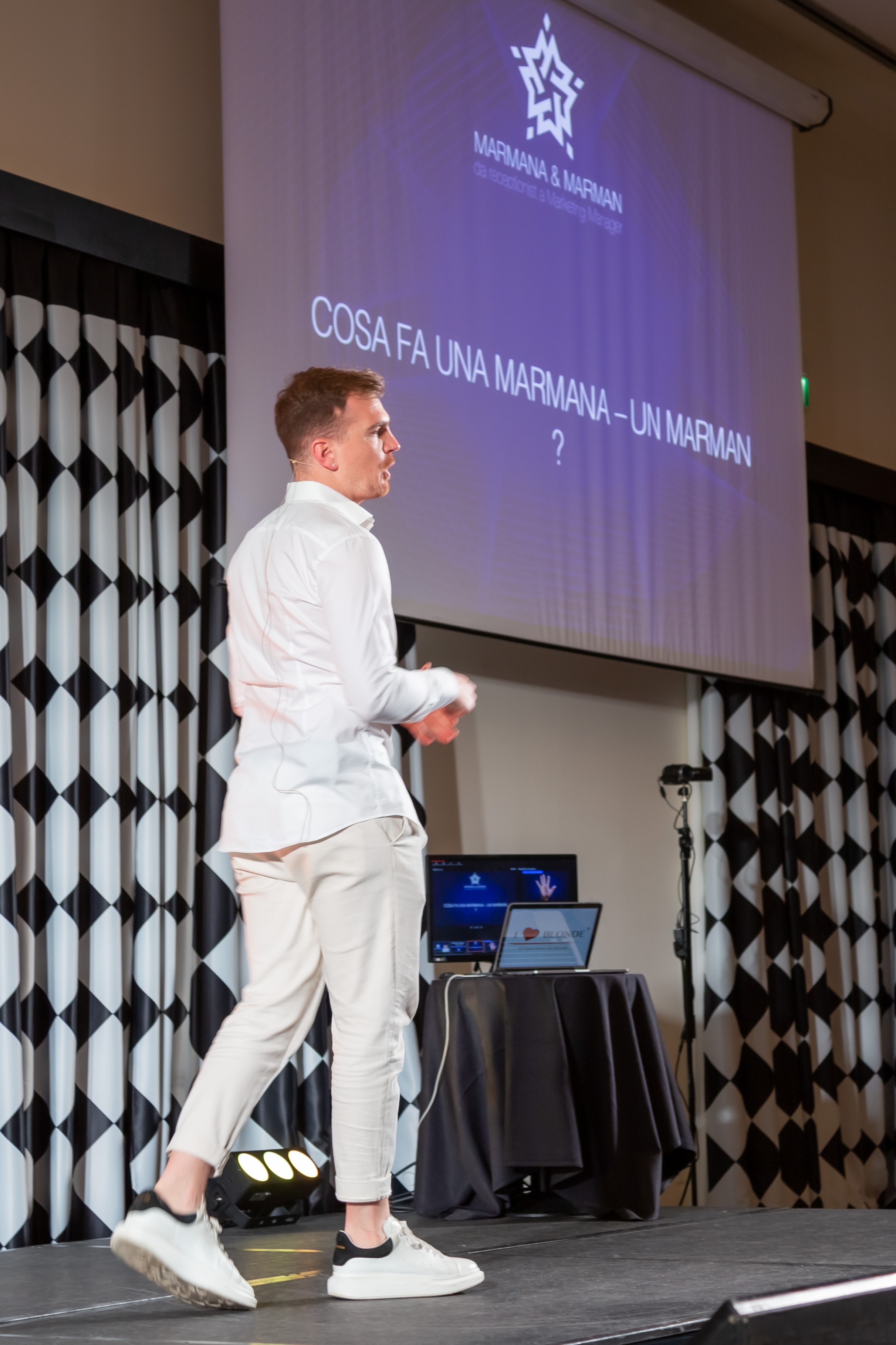 Alessandro Picchianti presenting on stage at a Marmana & Marman training event